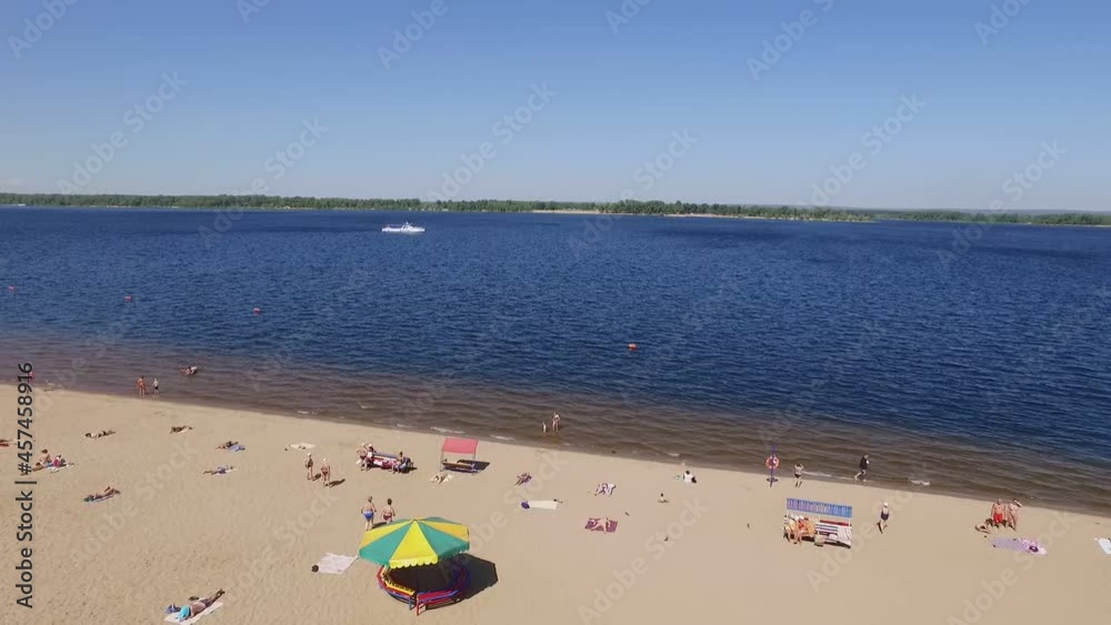 summertime in Samara, aerial view of golden beach on Volga river shore summertime in Samara, aerial view of golden beach on Volga river shore