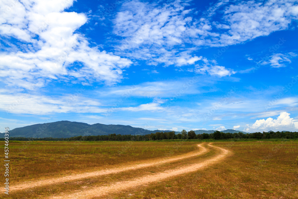 Clay road in beautiful landscape.