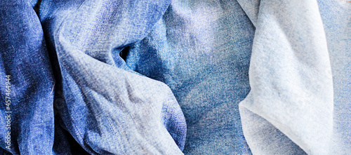 three gradients of denim from light blue to dark blue, fabric texture,