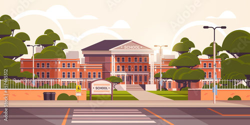 school building empty front yard with green trees road crosswalk summer cityscape background