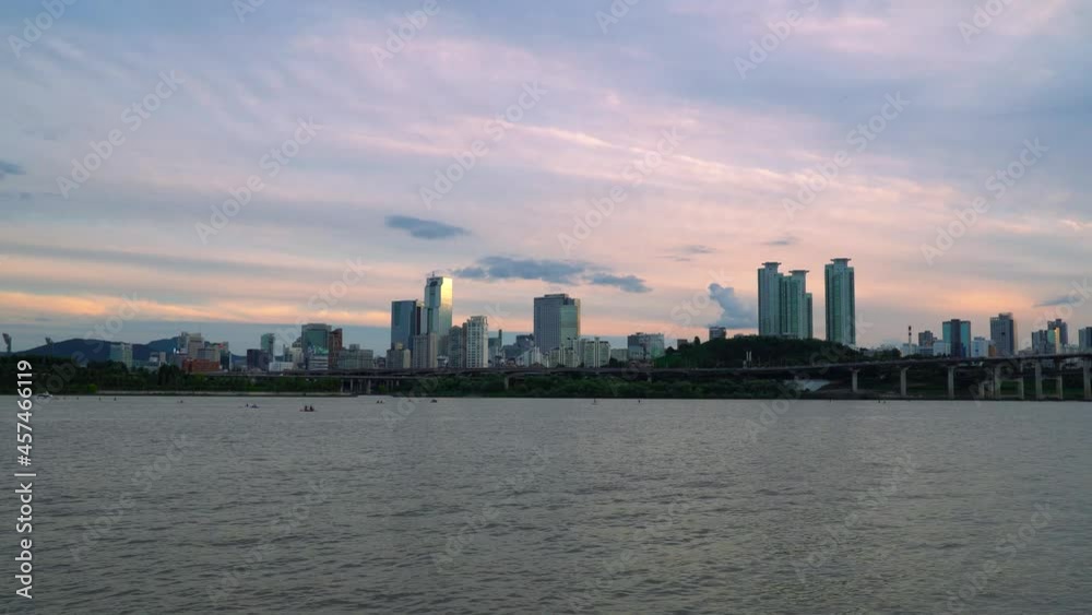 Dramatic Sunset View On City Towers Over Han River In Gangnam Districts In Seoul, South Korea. Wide Shot Dramatic Sunset View On City Towers Over Han River In Gangnam Districts In Seoul, South Korea. Wide Shot