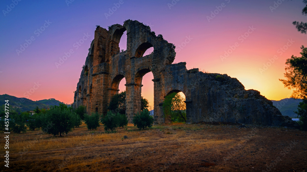 Ruins of the ancient Roman aqueduct in Turkey.Su Kemeri,Aspendos 2021. Ruins of the ancient Roman aqueduct in Turkey.Su Kemeri,Aspendos 2021.