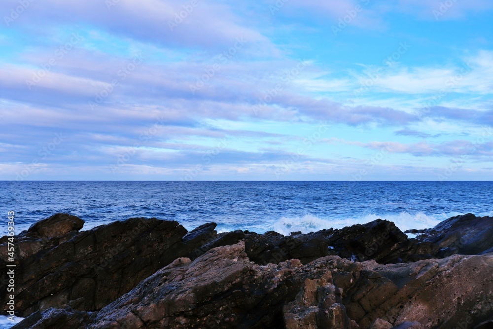 sea and rocks with blue sky