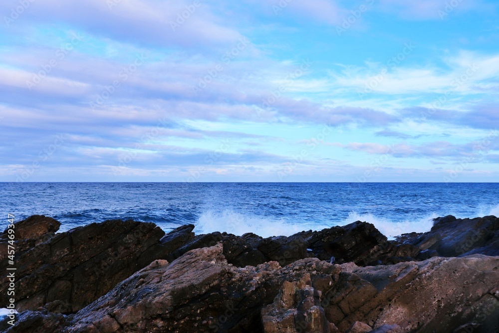 sea and rocks with blue sky
