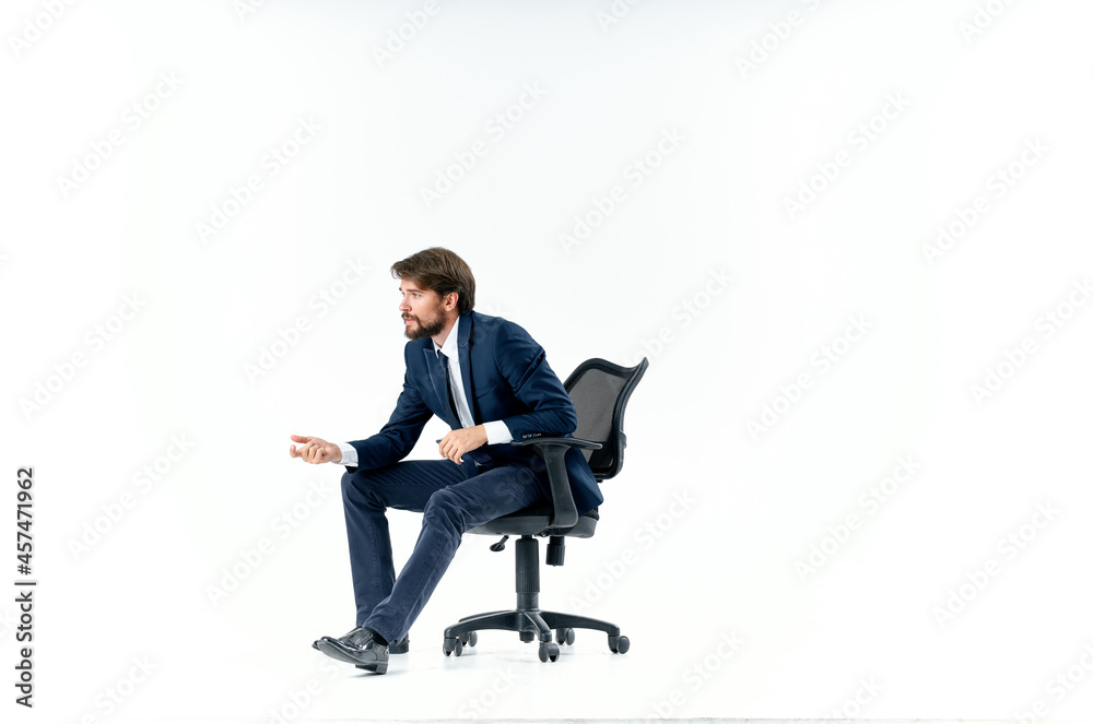 emotional business man in office chair work light background