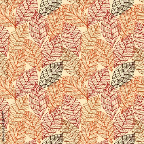 Seamless cute autumn pattern with fall leaves in warm color. Dark background