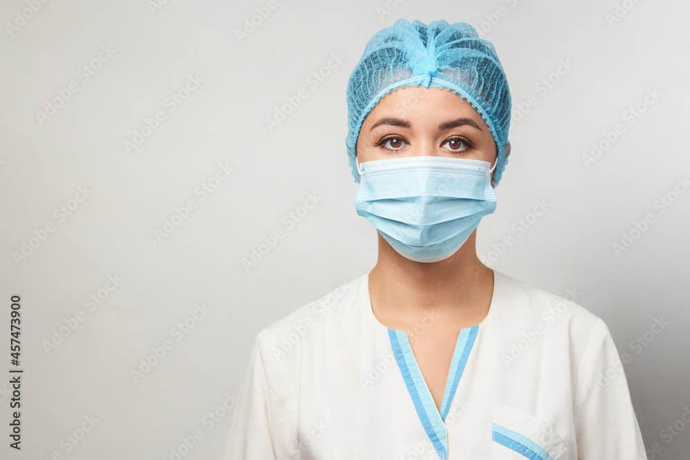 Portrait of young asian doctor in medical mask Portrait of young asian doctor in medical mask