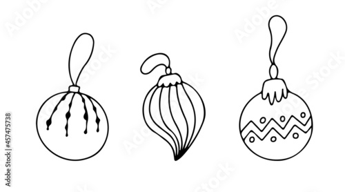 Set of hand drawn Christmas tree decorations in doodle style, isolated on white background. Sketch of Christmas toys, vector illustration