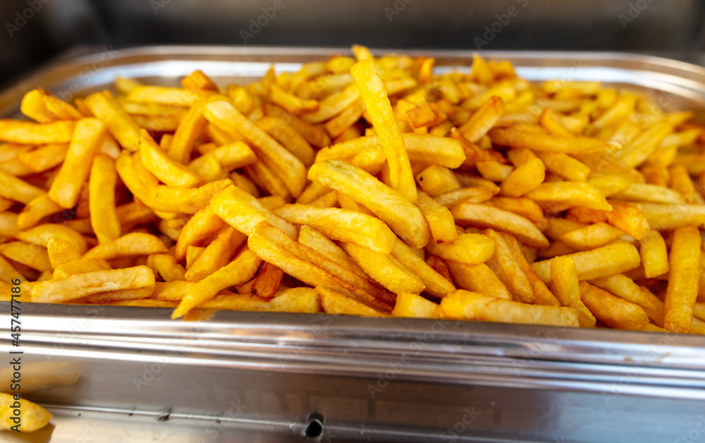 Fried French fries in a cafe. Fried French fries in a cafe.