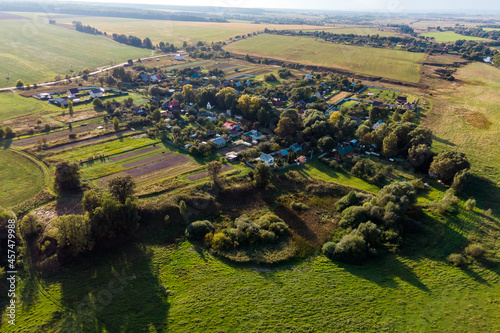 Aerial view of a small village, rural panorama. Village Gluboky Ovrag, Zhukovsky District, Kaluzhskiy Region, Russia photo