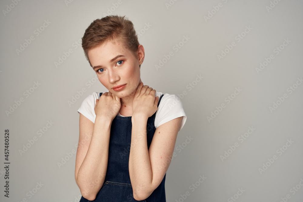 short haired woman in a sundress fashion cropped view short haired woman in a sundress fashion cropped view