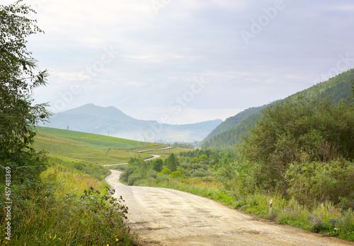 A winding empty road in the Altai Mountains