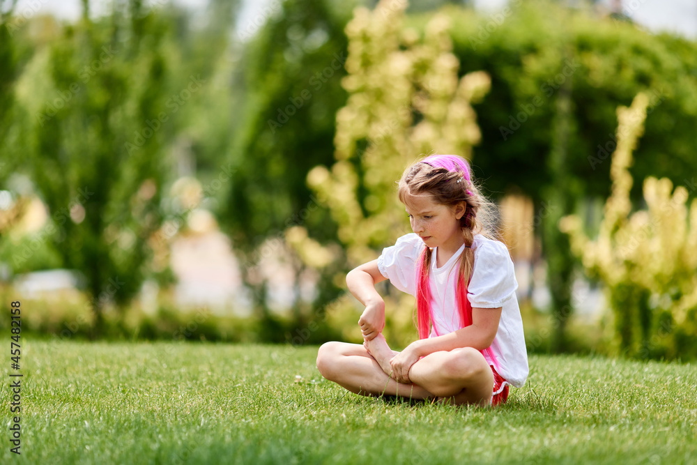 child girl with braided hair style with pink kanekalon