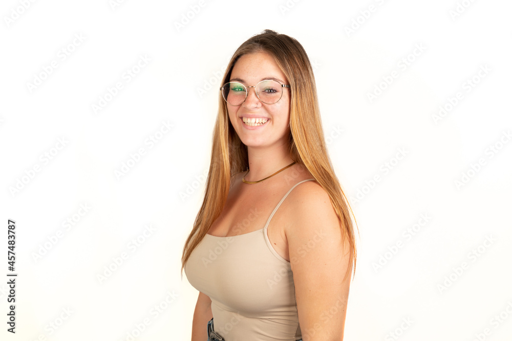 Handsome happy blonde woman smiling looking at camera. White background. 20 - 22 years old. White European woman. Handsome happy blonde woman smiling looking at camera. White background. 20 - 22 years old. White European woman.