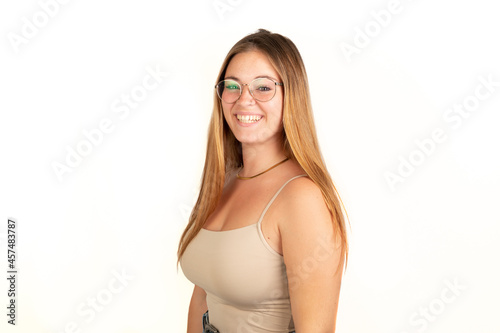 Handsome happy blonde woman smiling looking at camera. White background. 20 - 22 years old. White European woman.