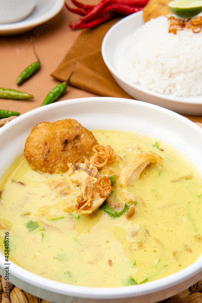 Nasi Soto Ayam or Soto Medan is  Traditional chicken soup with rice from Medan, North Sumatra. 

Soto is a traditional Indonesian soup mainly composed of broth, meat, fried patties and vegetables.