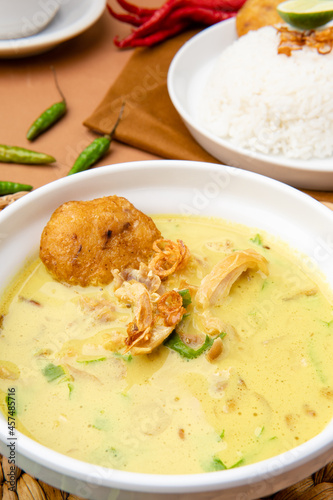 Nasi Soto Ayam or Soto Medan is Traditional chicken soup with rice from Medan, North Sumatra.Soto is a traditional Indonesian soup mainly composed of broth, meat, fried patties and vegetables.