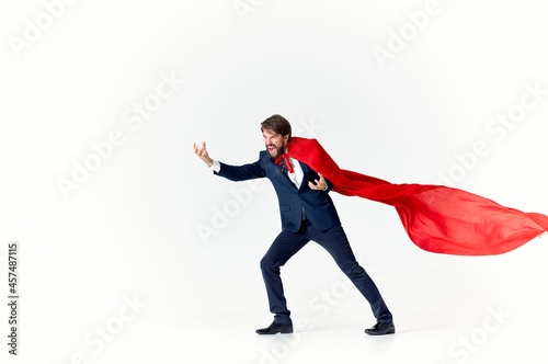 business man in suit red cloak power superhero city defense