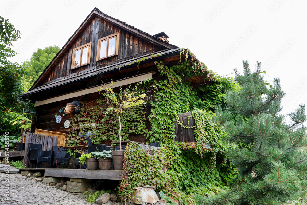 LANCKORONA, POLAND - SEPTEMBER 16, 2021: Wooden architecture inscribed on UNESCO world heritage list. Lanckorona, Poland. LANCKORONA, POLAND - SEPTEMBER 16, 2021: Wooden architecture inscribed on UNESCO world heritage list. Lanckorona, Poland.