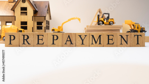 Prepayment was created from wooden cubes. Finance and Banking. photo