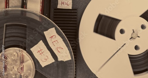 Vintage audio reel player. Reel audio recorder with tape rolls.  photo