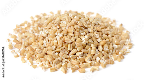 close up of raw steel cut oats isolated on white. (large depth of field, taken with tilt shift lens)
