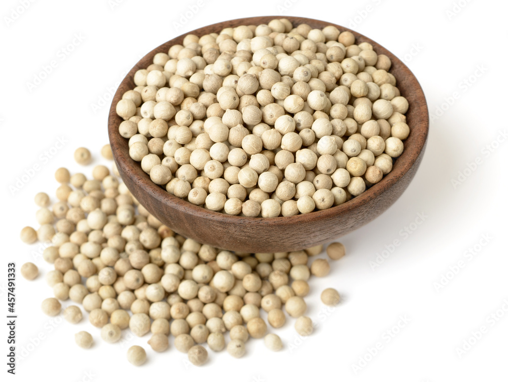 white peppercorns in the wooden bowl, isolated on white white peppercorns in the wooden bowl, isolated on white
