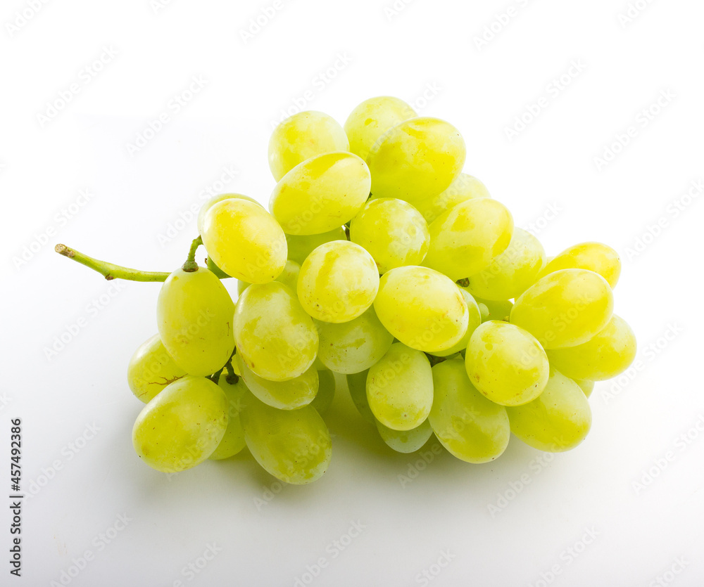 White grapes on white background. Fruit close-up photo