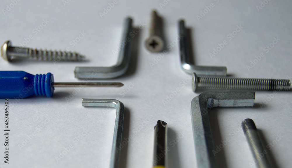 screwdriver and screws screwdriver and screws