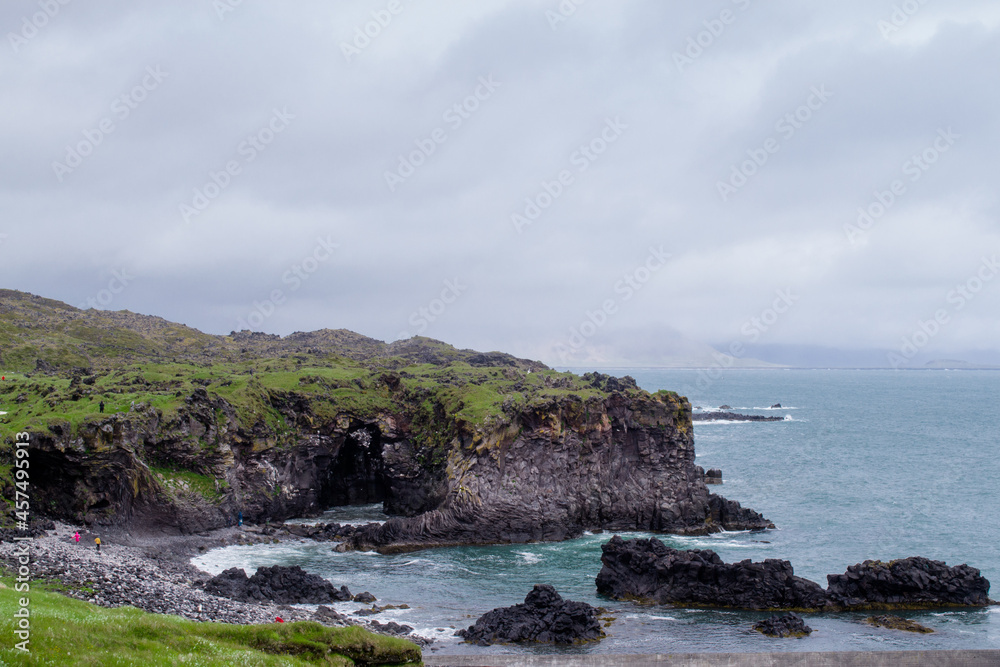View of the fjords coastline at Snaefellsnes Peninsula, Iceland. Cloudy day during summer