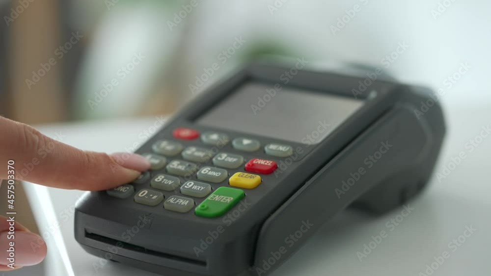 Woman paying with contactless credit card. Wireless money transaction. Wireless payment Woman paying with contactless credit card. Wireless money transaction. Wireless payment