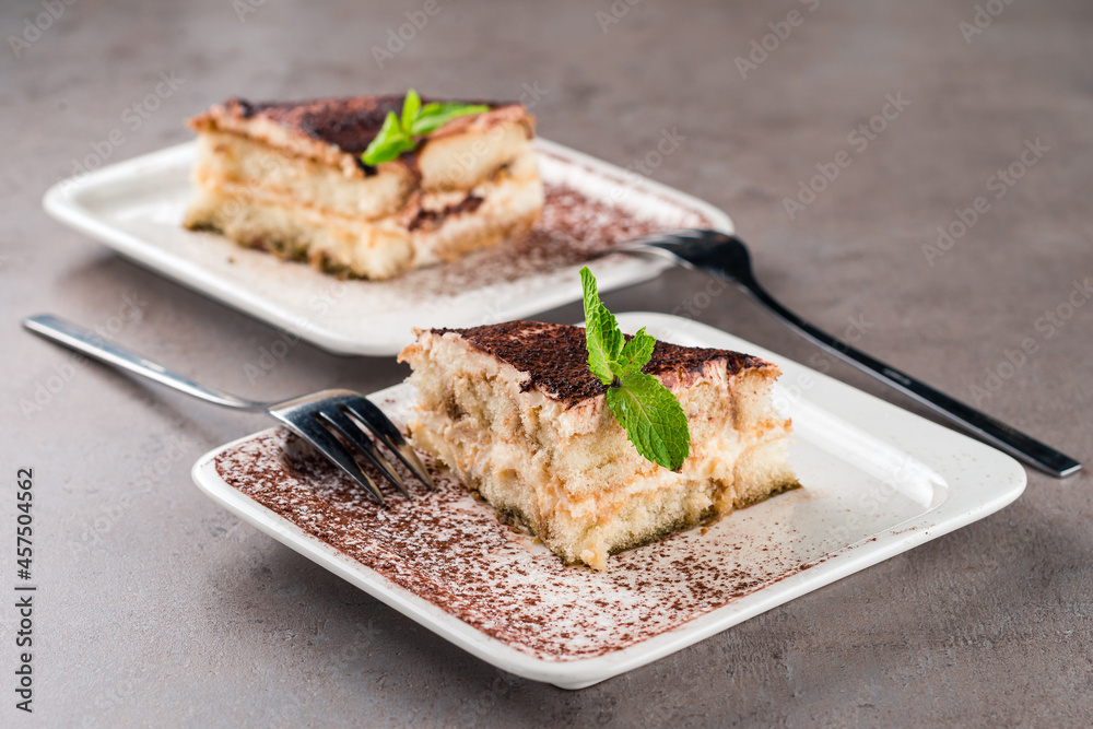 two slices of delicious sweet chocolate sponge cake Dessert served two slices of delicious sweet chocolate sponge cake Dessert served