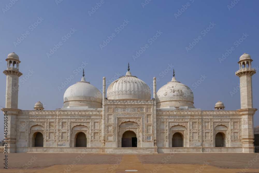 Front view of beautiful white marble Abbasi mughal style mosque outside Derawar fort in Cholistan desert, Bahawalpur, Punjab, Pakistan