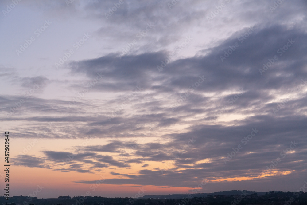 Cloudy sky at sunrise