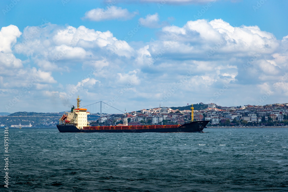 Cargo freight ship in Bosporus strait. Istanbul. Turkey