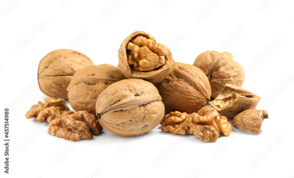 Pile of ripe walnuts on white background Pile of ripe walnuts on white background