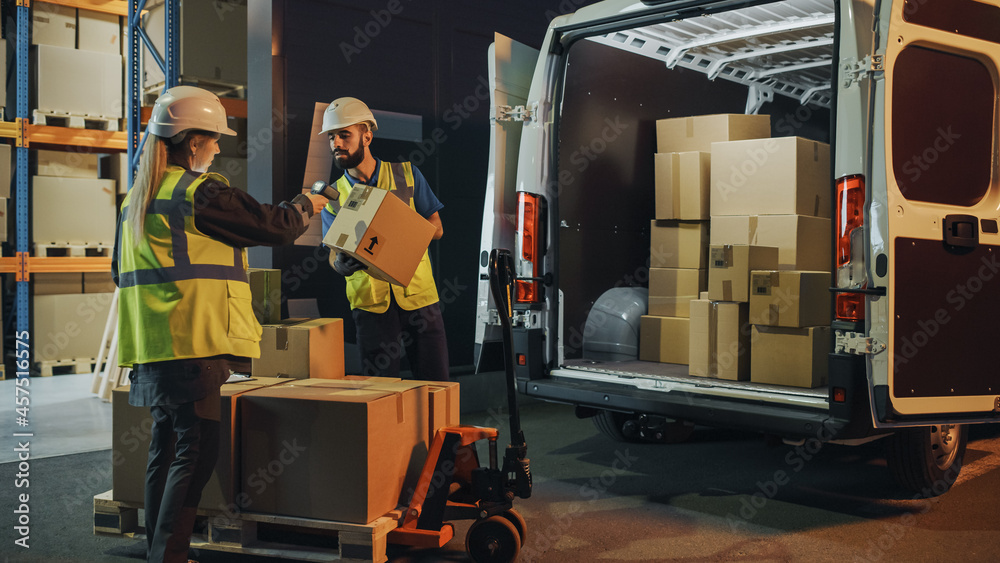 Outside of Logistics Retail Warehouse: Manager Using Tablet Computer and Scanner, talking to Worker Loading Delivery Truck with Cardboard Boxes, Online Orders, Medicine Supply, E-Commerce. Evening