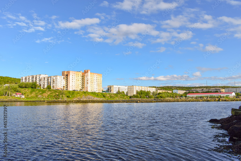 The area of a small town in the north of Russia on the shore of the bay.