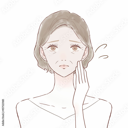 肌のくすみに悩む中年女性