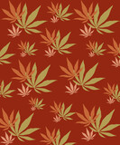 Orange and green pink leaves on earthy background.