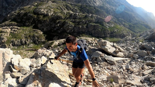 young man hiking in the mountains