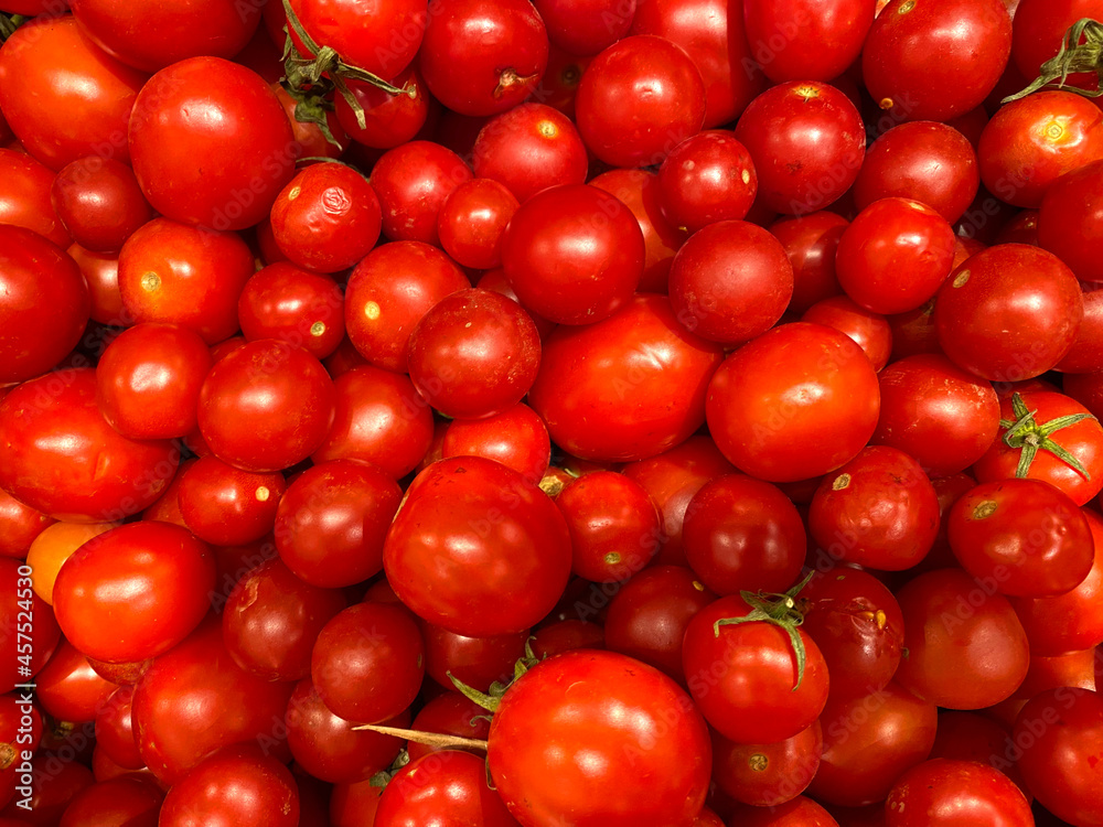 background from tomatoes. A group of tomatoes.