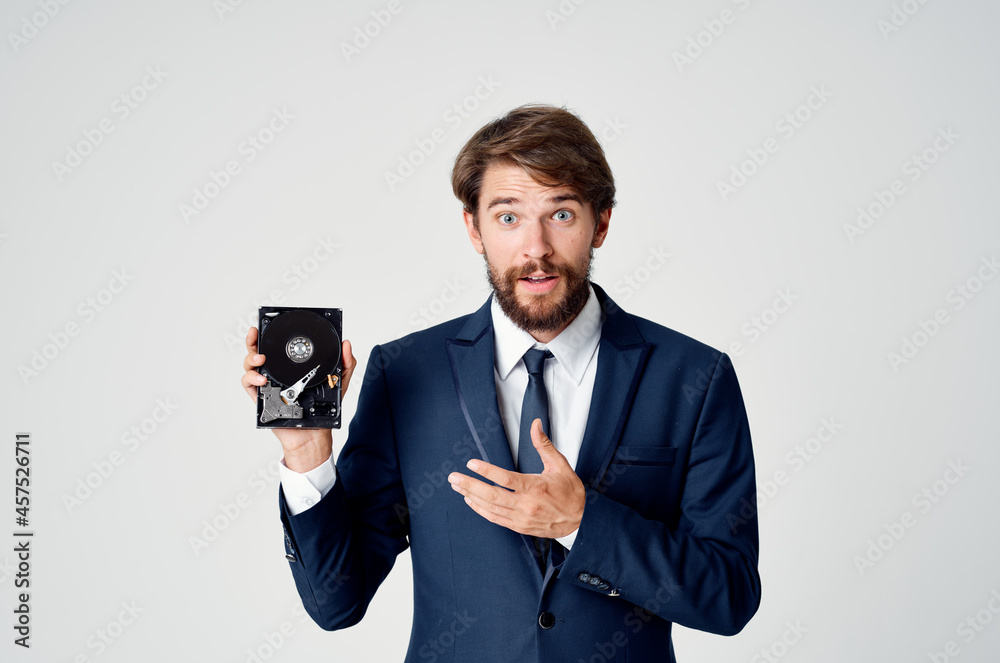 business man in suit and technology hard drive information business man in suit and technology hard drive information