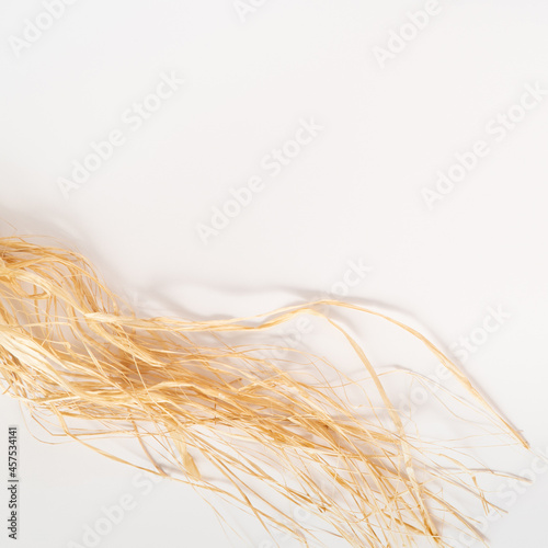 фотографія Natural raffia fiber on a white background