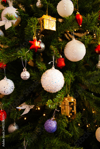 christmas decor, toys, bows, glass balls, bokeh, background, toys, merry christmas, happy new year. 2022. Lights, sparkles and glare, snow. 