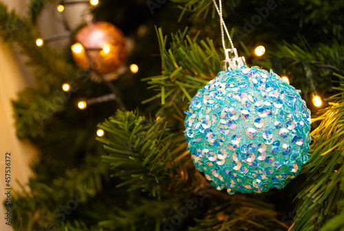 christmas decor, toys, bows, glass balls, bokeh, background, toys, merry christmas, happy new year. 2022. Lights, sparkles and glare, snow. 