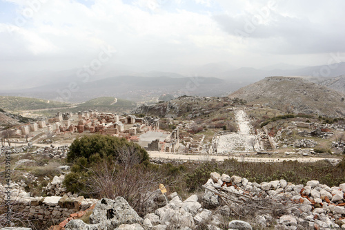 Panoramic view to the ruins of ancient city Sagalassos lost in Turkey mountains