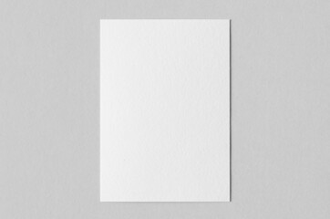 Textured A6 invitation card or flyer mockup, portrait orientation.