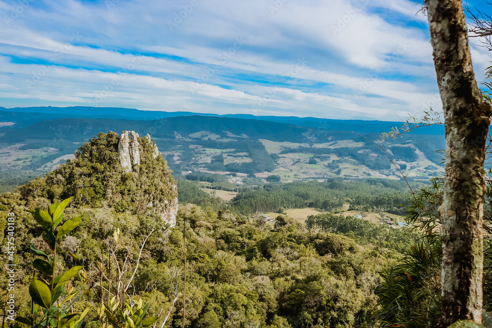 perforated stone overlooking nature.