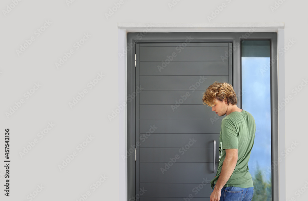 Man opening the door of her home.Inviting the guests. Man opening the door of her home.Inviting the guests.